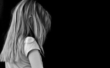 girl looking very sad