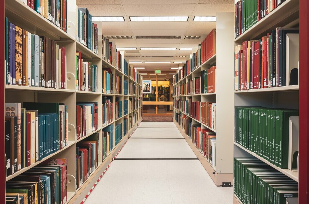 books on shelves in library