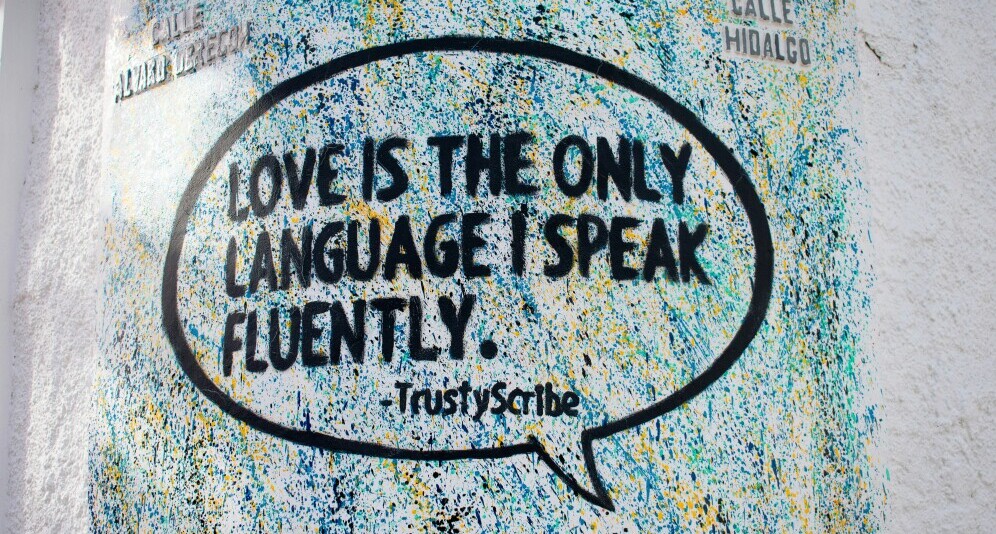 5 love languages - poster saying "love is the only language I speak"