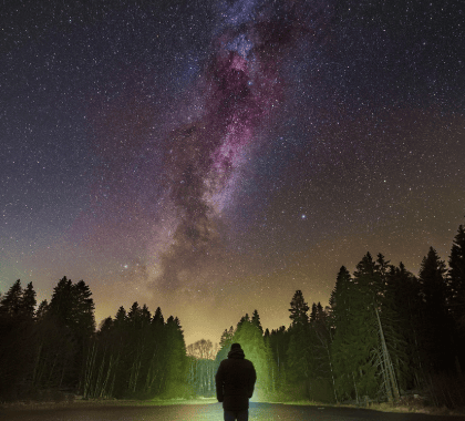 A person looking at the Milky Way