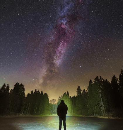 A person looking at the Milky Way