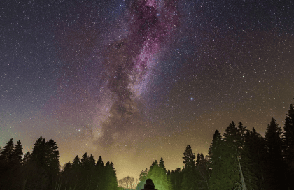 A person looking at the Milky Way