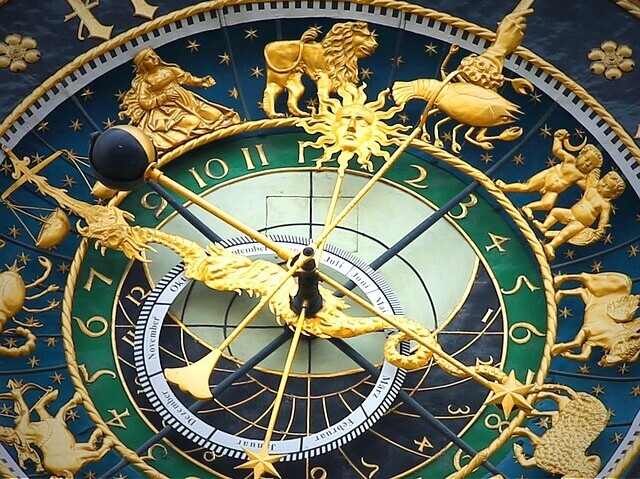 astronomical clock showing the sun in Leo as in the Lions Gate Portal
