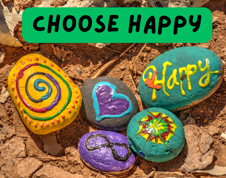 Selection of colourful painted stones suggesting happiness and love