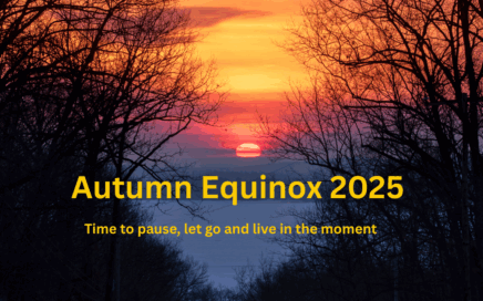 A sun rise shown between two silhouetted trees with text overlay about Autumn Equinox